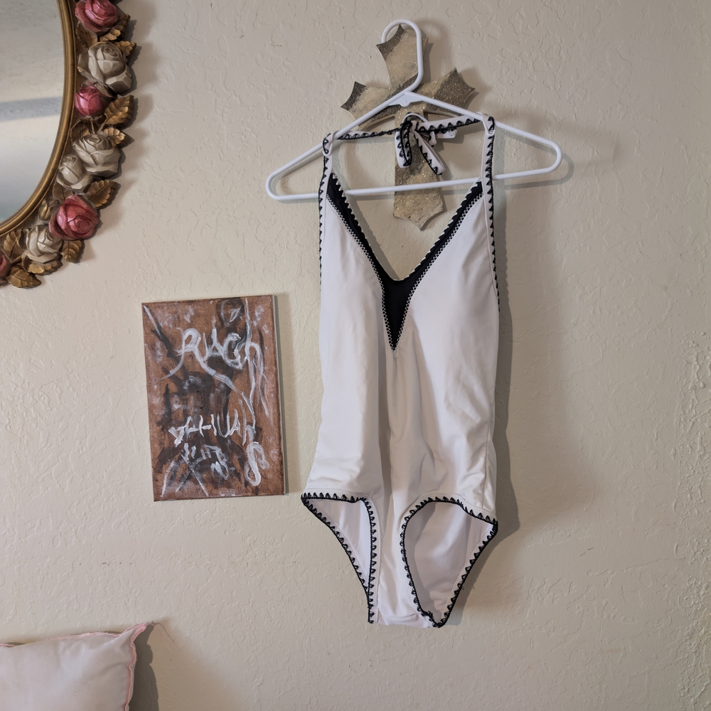 Chic White and Black One-Piece Swimsuit with Plunging V-Neck